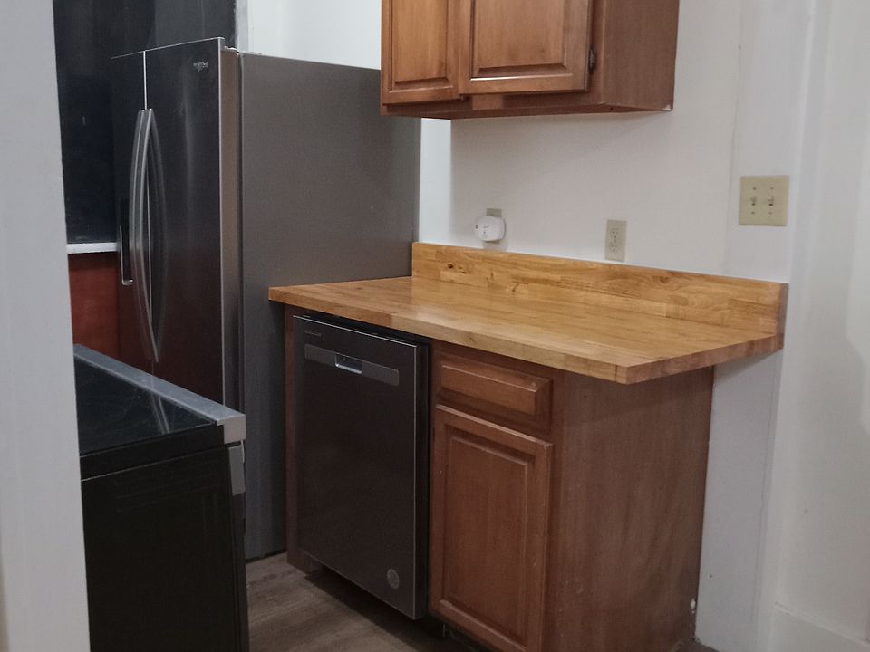 Kitchen from side of living room entrance.