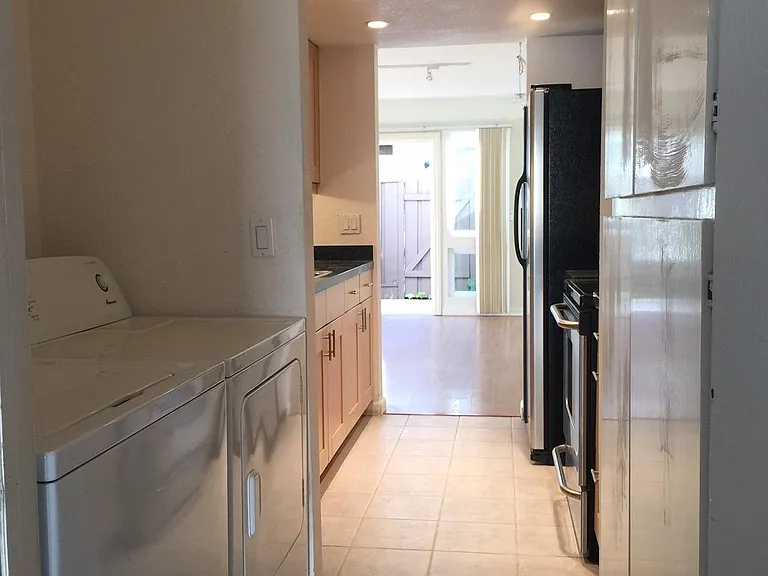 Laundry - Kitchen - Dining / Living - Backyard