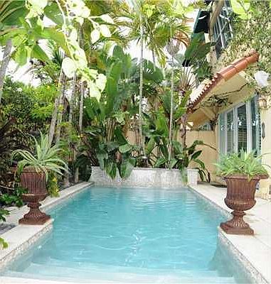 Lushly landscaped swimming pool