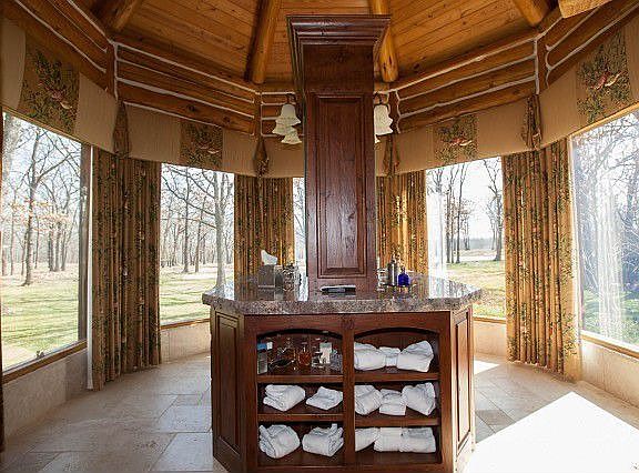 Massive exposed beams adorn rugged great room 