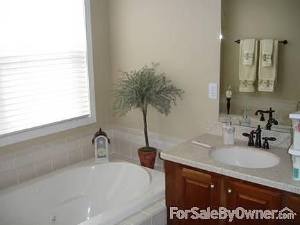 Master Bathroom
						:
						Corian counter top, corian double sink, shower, whirlpool tub