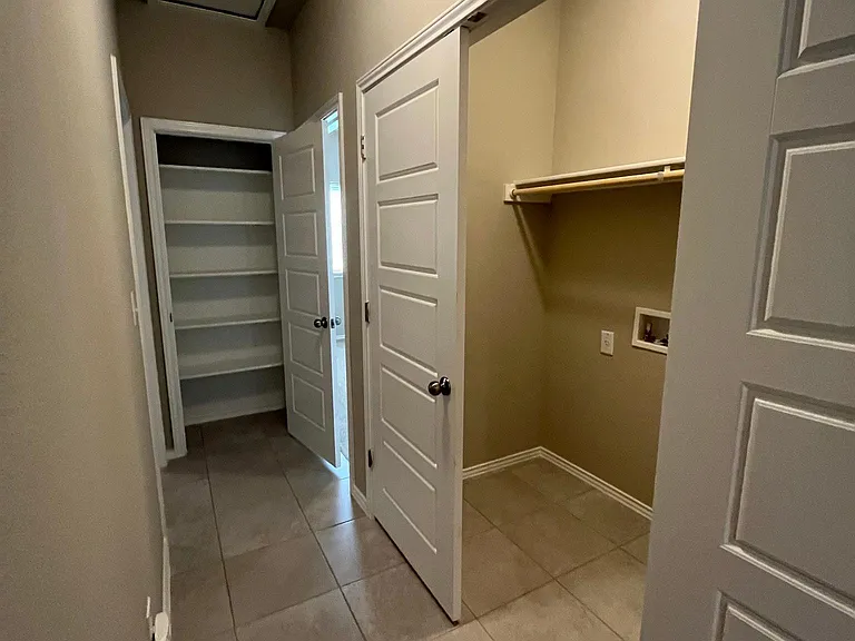 Laundry room (there is Washer and Dryer provided) not shown in this photo. Notice plenty of storage