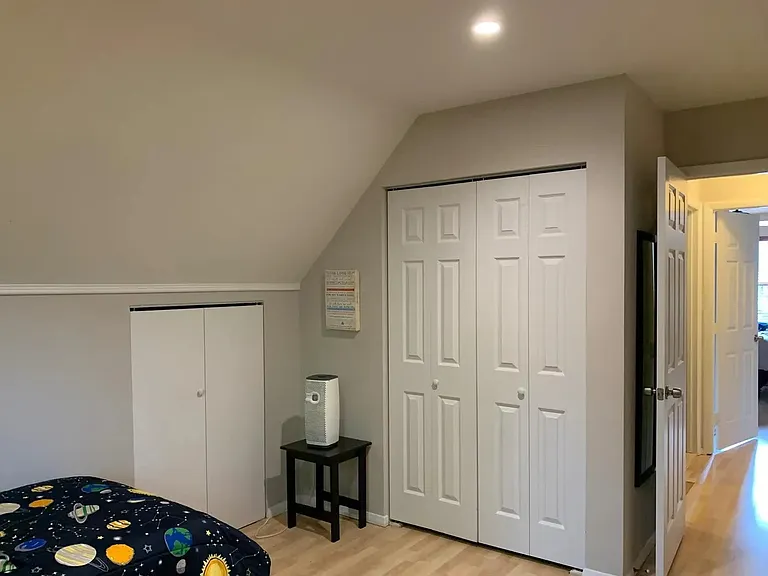 Upstairs bedroom #1, closets.
