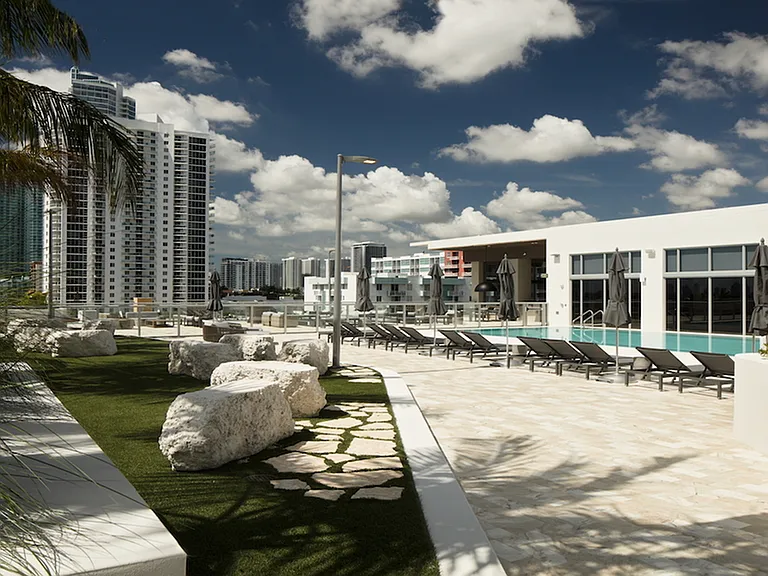 Rooftop deck with poolside seating