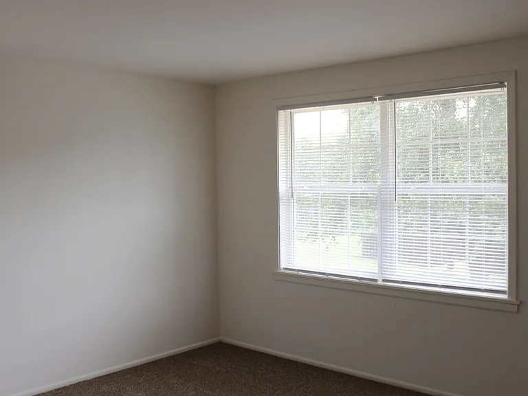 3 Bedroom Townhome Bedroom at Carriage House West