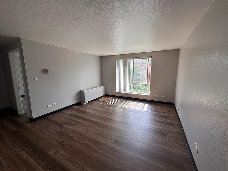 Living Room with updated vinyl plank flooring