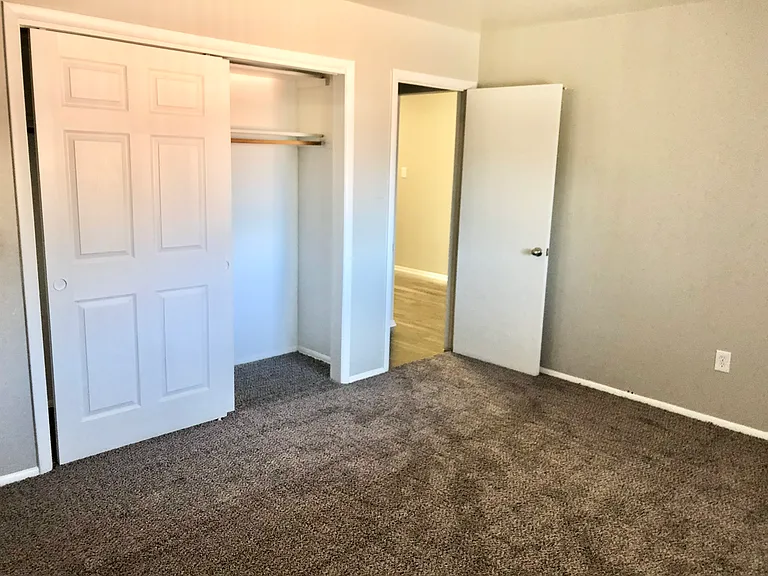 Step into this inviting bedroom with a roomy closet space and plush carpeting. Step into this inviting bedroom with a roomy closet space and plush carpeting.