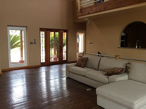 Large living room area with plenty of natural light...