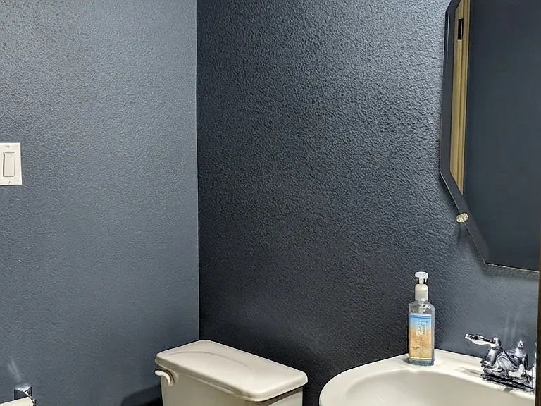Powder room. Contains an addition very spacious storage room