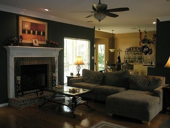 Livingroom with hardwood floors and new fan/light fixture