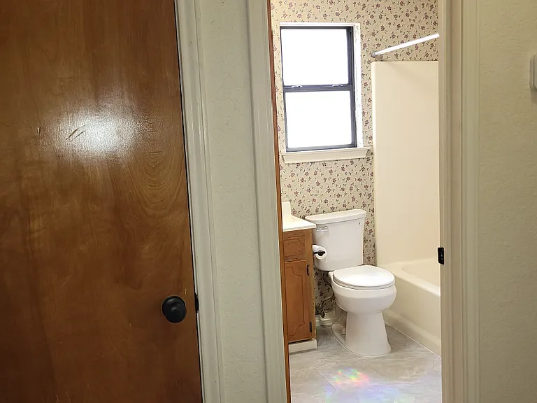 Hallway view of 2nd Bathroom