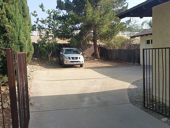 Fenced drive with extra parking