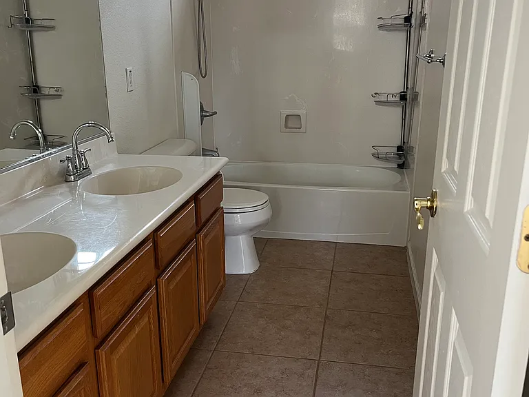 Upstairs full bathroom with double sink