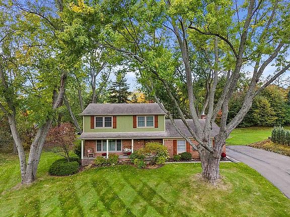 Expansive Front Yard with Mature Trees