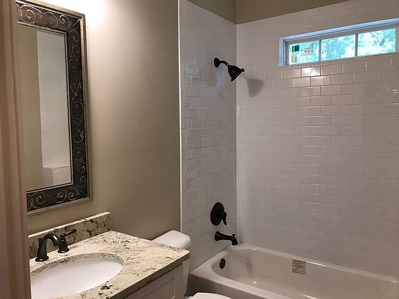 Bath with tile surround 