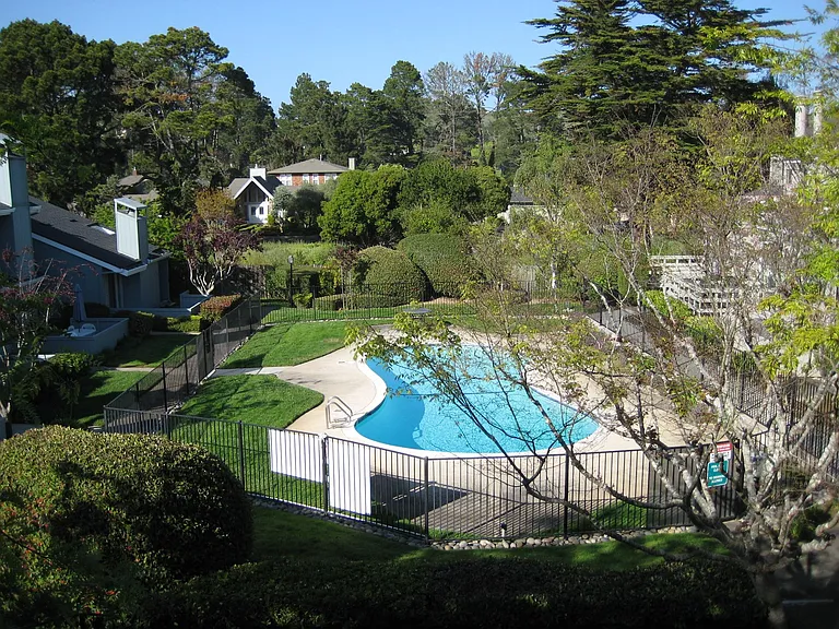 View of pool from kitchen, family room...