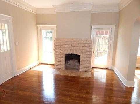 Living rm w/fp, new paint, refinished floors.