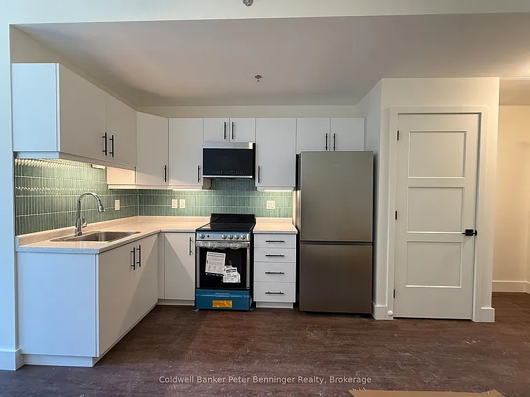 604 Queen St S #202 — Photo 1