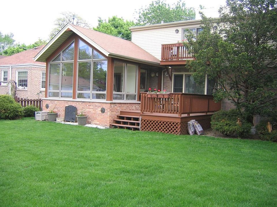 Sunroom addition and attached deck