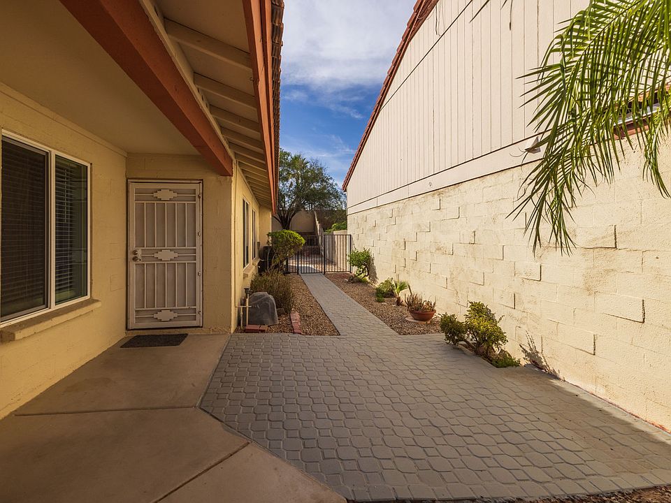 Wide side patio with plenty of afternoon shade.