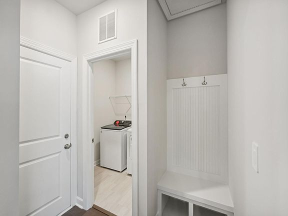 Enjoy the convenience of an oversized laundry room with space for folding and sorting.