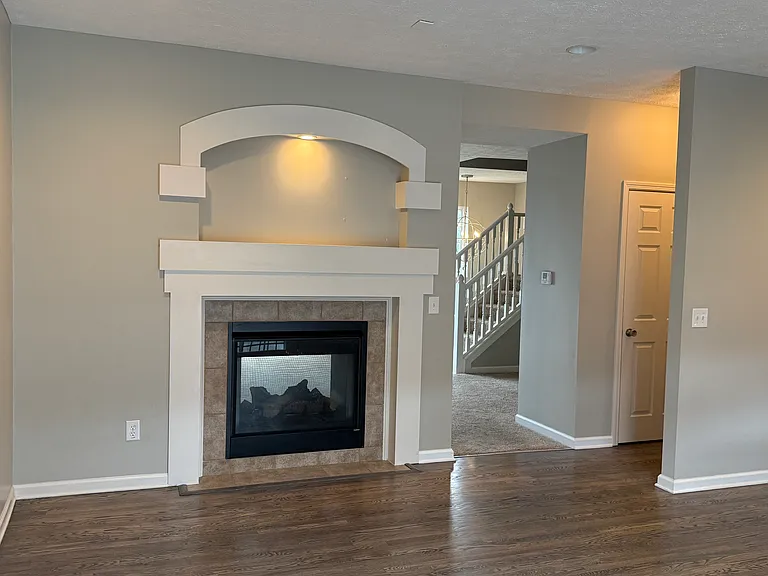 The eat-in kitchen/dining room shares a double sided fireplace with the livxingroom. This fireplace is truly the heart of the home in the winter.