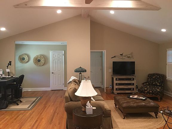 The ceiling in the great room has been vaulted. Recessed lighting in four zones.