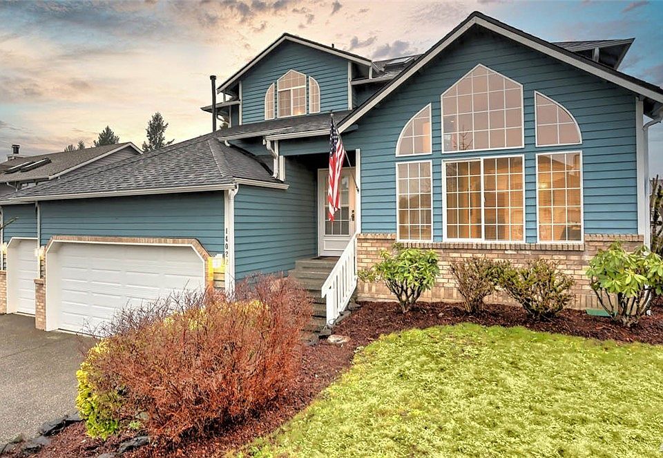 Fabulous 4 bedroom, 2 1/2 bath home plus office and 3 car garage!