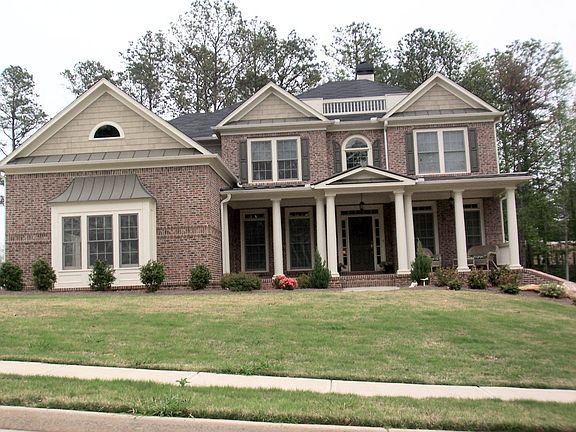 7 bedrooms, 5 bath w/ finished basement home. Wooded .61 acre lot 