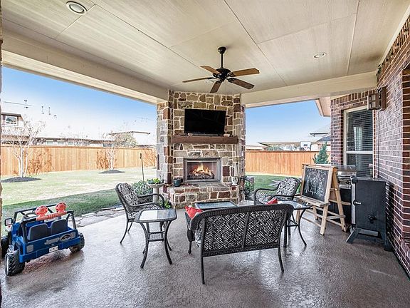 Large Covered Back Patio has Room for a Summer Kitchen!