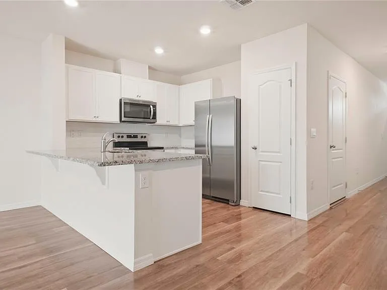 1311 Tallowwood Ln — Photo 7