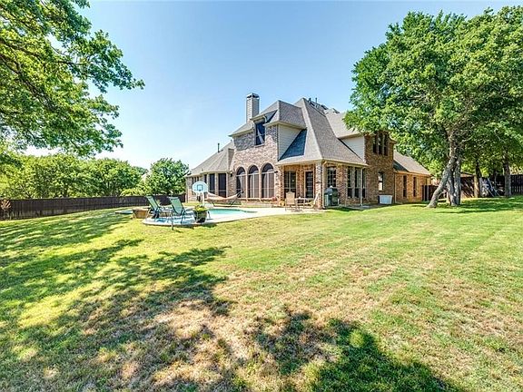 Nearly half acre private lot with trees and pool!