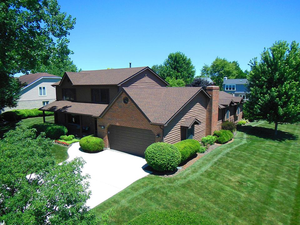 Brick & Cedar 2-story with large covered front porch. Front porch ceiling is pine tongue & groove. Professional landscaped yard and lawn.