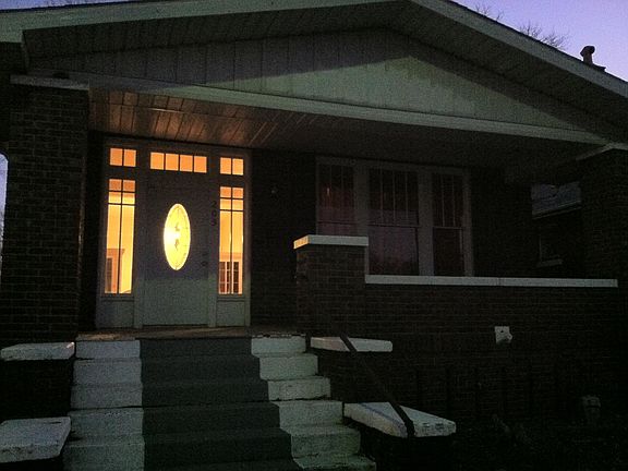 Front view with large porch