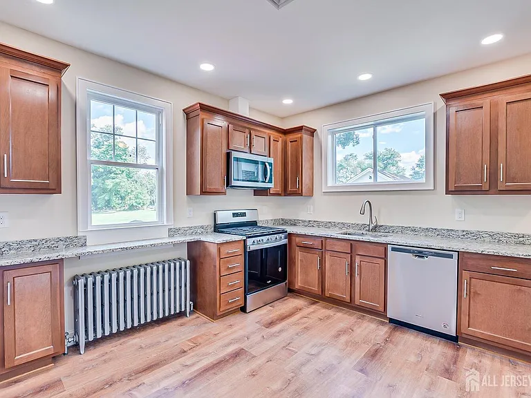 338 Buckelew Ave — Photo 13