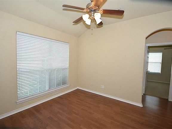 Media/Office/Formal Dining. Just a great flex room at front of the house. Notice the pretty arches again?