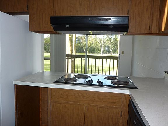 Kitchen has all the appliances, view thru to golf course