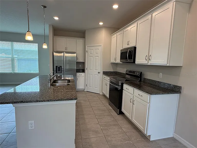 5072 Avalon Park Blvd — Photo 8