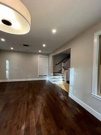 Living room looking upstairs.