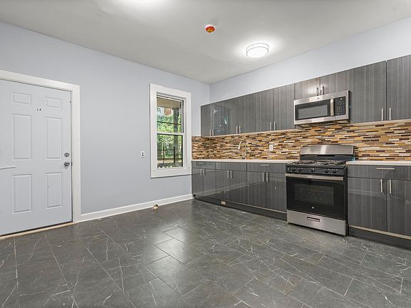 Kitchen, Dinette, Appliances.
This Door Leads To The Deck.