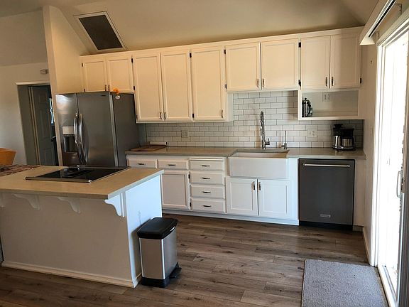 Kitchen/Dining area, new appliances, new countertop etc.
