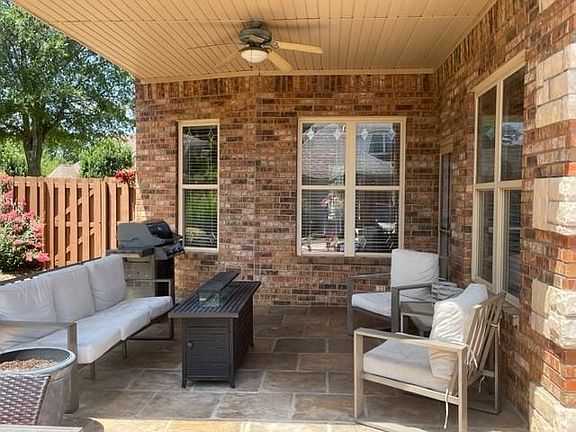 Covered patio area in back yard