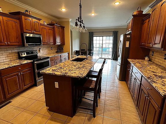 Updated granite / backsplash