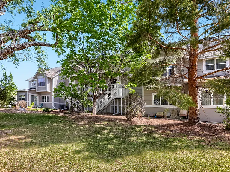 Back of townhouse, backyard and common space