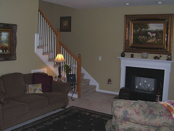 Den, 18x15 w/fireplace and indirect lighting. 