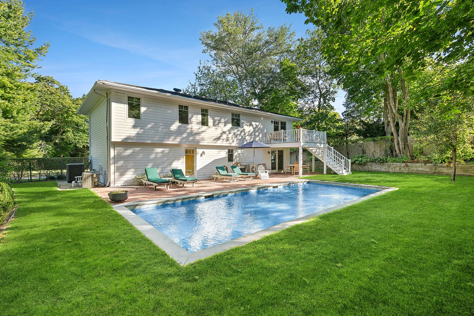  Large Backyard with Heated Gunite Pool and Landscaped Gardens