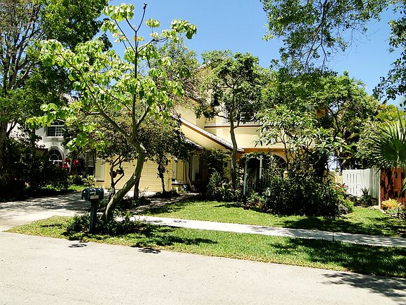 Front of home, lots of trees