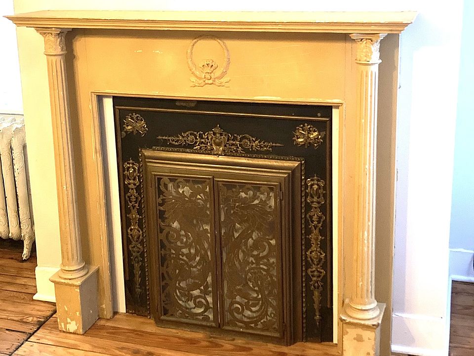fireplaces are decorative only, original to 1885; this one fireplace was bricked up to use chimney for furnace exhaust pipe