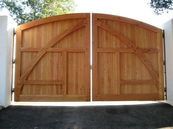 Timber-framed entry gates to private drive