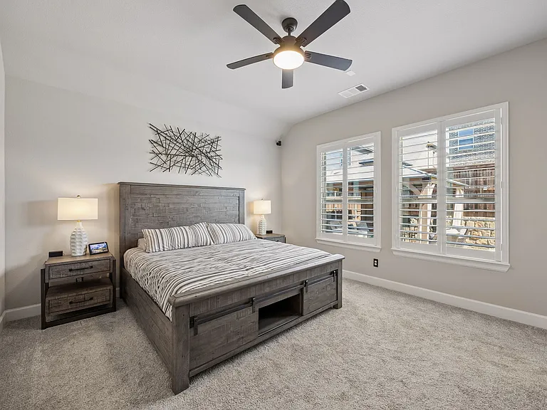 Primary Bedroom with large windows and plenty of natural light throughout the day